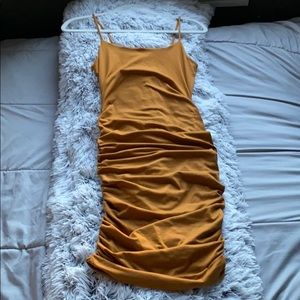 Mustard colored ruffled dress